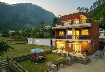 Prakriti with River View- Pet Friendly Retreat with Plunge Pool by StayVista has Balcony rooms