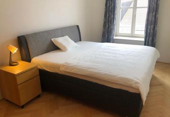 Old Town City Apartment has rooms with a private hot tub