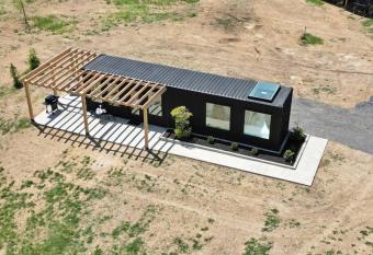 Charming Container Getaway Amidst Rural Serenity allows 18 year olds to book a room