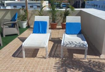 Dulce Hogar con Ambiente Tropical has rooms with a private hot tub