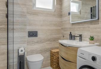 Luxury apartment on the beach has rooms with a private hot tub