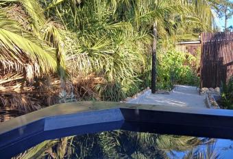 Santika Sunhill Cottage has rooms with a private hot tub