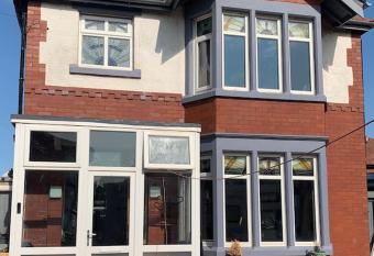 Family Holiday Home has rooms with a private hot tub