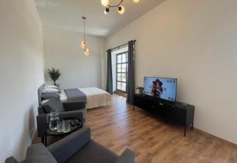 Yellow Rose Studio has Balcony rooms