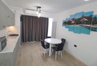 Infinity Pool Beach Resort and Spa Apartments has rooms with a private hot tub