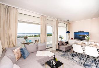 Fewo Sommerliebe, mit Meerblick und Schwimmbad direkt am Hansapark has Balcony rooms