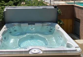 Luxurious bastidon with swimming pool and jacuzzi has rooms with a private hot tub