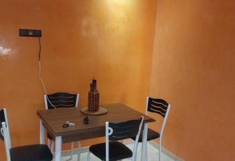 Appartement bouznika Kettani has rooms with a private hot tub