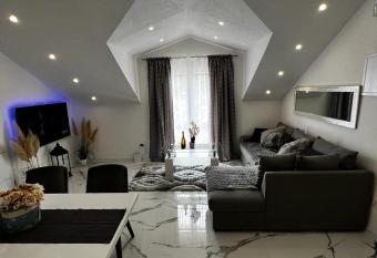 Luxury Apartment Megy has Balcony rooms