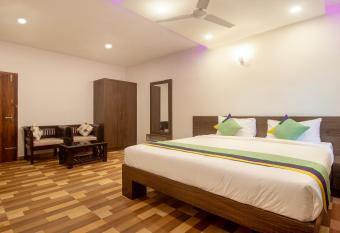 Treebo Trend Elite Plaza 700 Mtrs From Madikeri Fort allows 18 year olds to book a room
