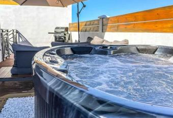 Villa cap zen and spa has rooms with a private hot tub