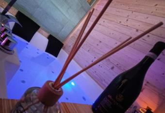 SUITTINA, exclusive - wellness - living has rooms with a private hot tub