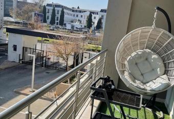 Spacious Apartment has rooms with a private hot tub