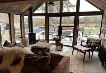 Riverside 2 Bed Cabin With Paddle Boards & Bikes has Balcony rooms