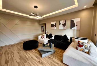 SuperHost Modern Condo 5 mins to the beach! has Balcony rooms