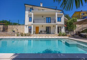 Luxury Kvarner Park Villa with beautiful garden and private pool has Balcony rooms