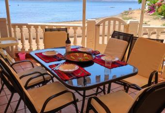 Casita en primera linea de playa has Balcony rooms