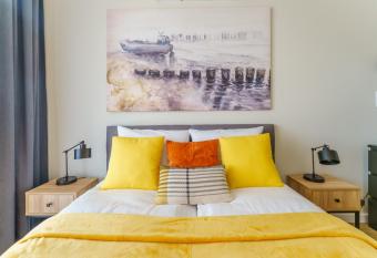 Apartament Przy Pla  y z Gara  em i Rowerami - by Per  owa Przysta   Rent has Balcony rooms