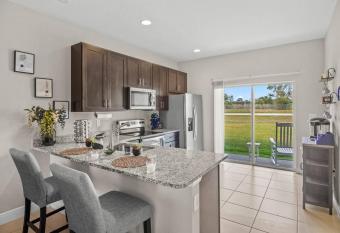 Luxury and tranquility, In the Heart of Poinciana, just 30 min from Disney! allows 18 year olds to book a room