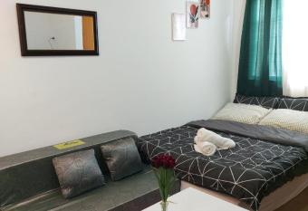 Fully Furnished Staycation - Neflix, Pool,Can cook near Mactan Airport has Balcony rooms