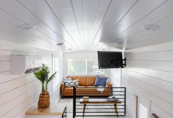 modern home with private hot tub has rooms with a private hot tub