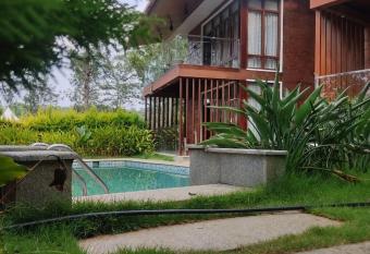 JJ Cottages Coorg by Lexstays has Balcony rooms