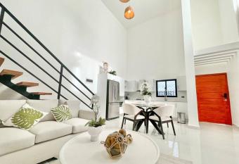 Acogedora Townhouse 3BR picuzzi y BBQ Punta Cana has rooms with a private hot tub