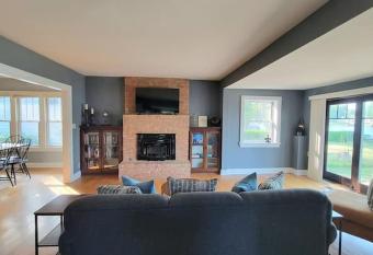 Riverfront Charmer with Character & Entertainment has rooms with a private hot tub