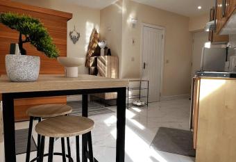 Jacuzzi Getaway with Sauna and Super King Bed has rooms with a private hot tub