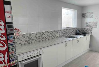 Casa grande a 3 minutos de la playa has Balcony rooms