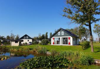 Detached, light chalet with dishwasher not far from Hoorn has Balcony rooms
