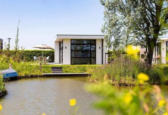 Detached, modern chalet with dishwasher, 8 km from Hoorn has Balcony rooms