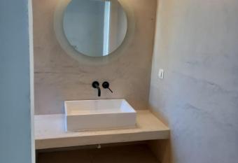 Lejardin suites santorini has rooms with a private hot tub