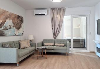 Aria Apartment with Jacuzzi has rooms with a private hot tub