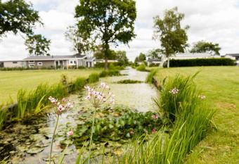 Modern chalet with outdoor sauna and spa, on a holiday park, Hoorn at 8 km has Balcony rooms