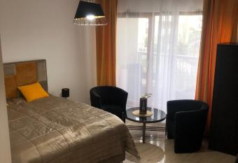 Golden Apartment has Balcony rooms