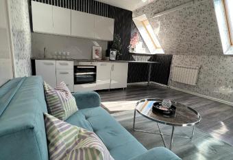 Cozy room with kitchen near the lake has rooms with a private hot tub