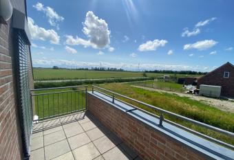 Entspannter Feriengenuss im Ferienhaus Jasmin - Ihr R  ckzugsort in der zauberhaften Krummh  rn, Ostfriesland has Balcony rooms