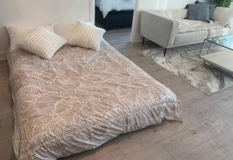 Exquisite Brand New Condo/3BR/8Guests/1Parking has rooms with a private hot tub