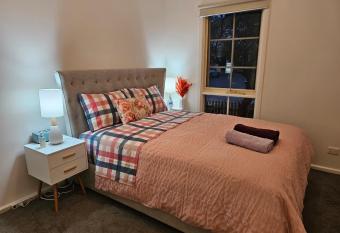 Charming Ground Level Haven in Kensington has rooms with a private hot tub