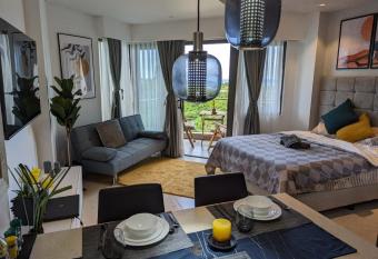 Dominiks Stylish Resort Gem Ocean View Pool Queen Bed at Tambuli 8 Floor Fast Wifi allows 18 year olds to book a room