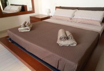 Villa with large outdoor spaces has rooms with a private hot tub