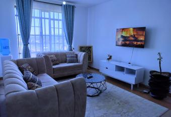 FLOZZY HOMES has rooms with a private hot tub