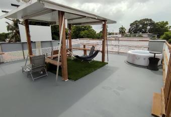 Cozy and Modern Apartment Black & White with Jacuzzi on Terrace has rooms with a private hot tub