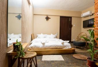 The weavers inn has Smoking/Balcony rooms