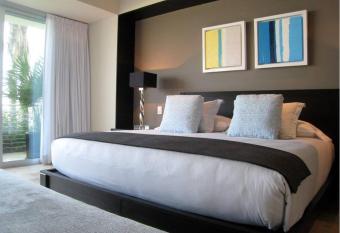 Gran departamento a 5 min del centro has rooms with a private hot tub