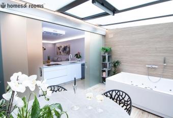 Loft rom  ntico con jacuzzi has rooms with a private hot tub