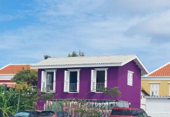 Purple house in colorful city centre allows 18 year olds to book a room