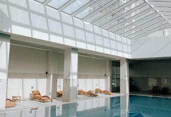 Skyview City Apartment has rooms with a private hot tub