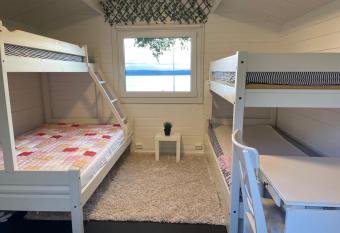 Vacation house you must be 4-8 guests and rent both rental parts This unit belongs to Nice Apartment with 1 bedroom with separate living room with a sofa bed and a kitchen and a bathroom has Balcony rooms